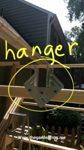 Marking where the roof joists are to go put the roof hanger. This is by far the easiest way to do a roof. You just measure carefully and screw into place
