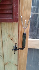 I made a handle from a cheap garden tool and had a gate latch hubby modified so that if someone gets 'locked in' the shed they can pull the special release and get out. He is brilliant!